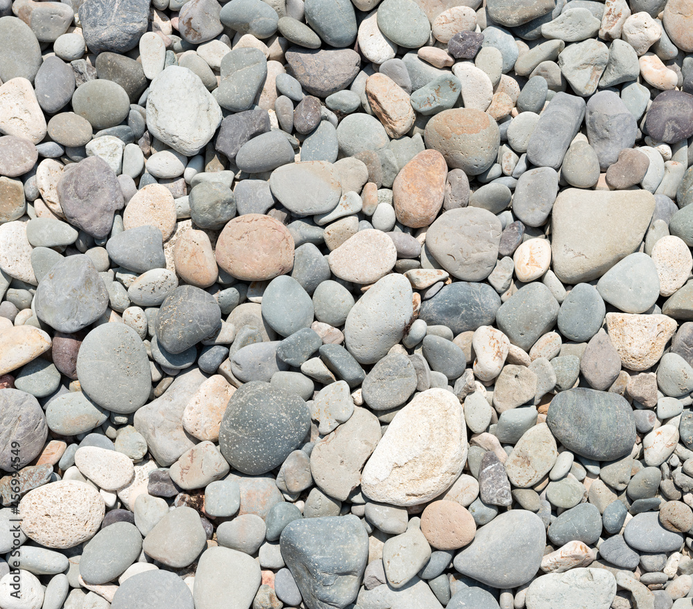 Close-up view of different pebble as background. Close-up view of different pebble as background.