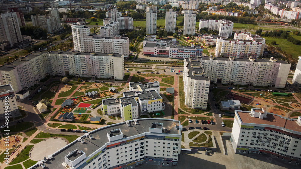 City block. Modern multi-storey buildings. The courtyard area and playgrounds are visible. Aerial photography.