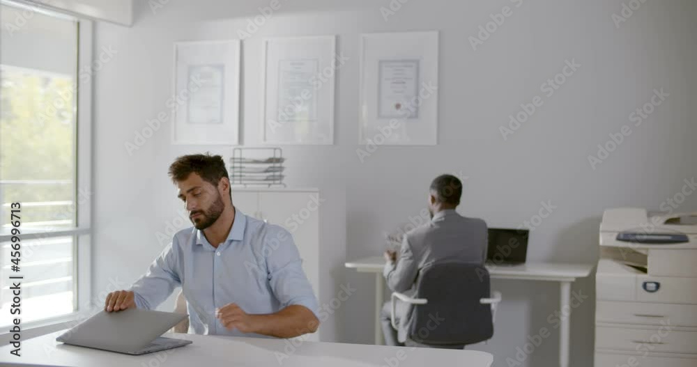 Indian businessman leave workplace and say goodbye to colleague Indian businessman leave workplace and say goodbye to colleague