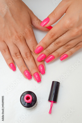 manicure set and nail polish on white background
