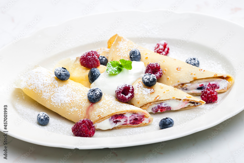 pankaces filled with blueberries, raspberries and cream pankaces filled with blueberries, raspberries and cream