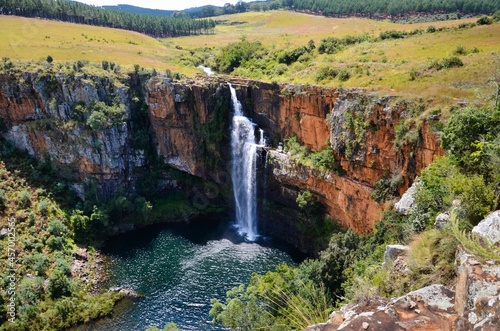 Berlin Falls Waterfall in Mpumalanga South Africa where a stream of water drops cliff into a lake