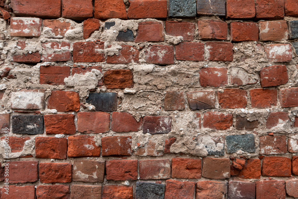 Obraz premium old brick and concrete textured wall 