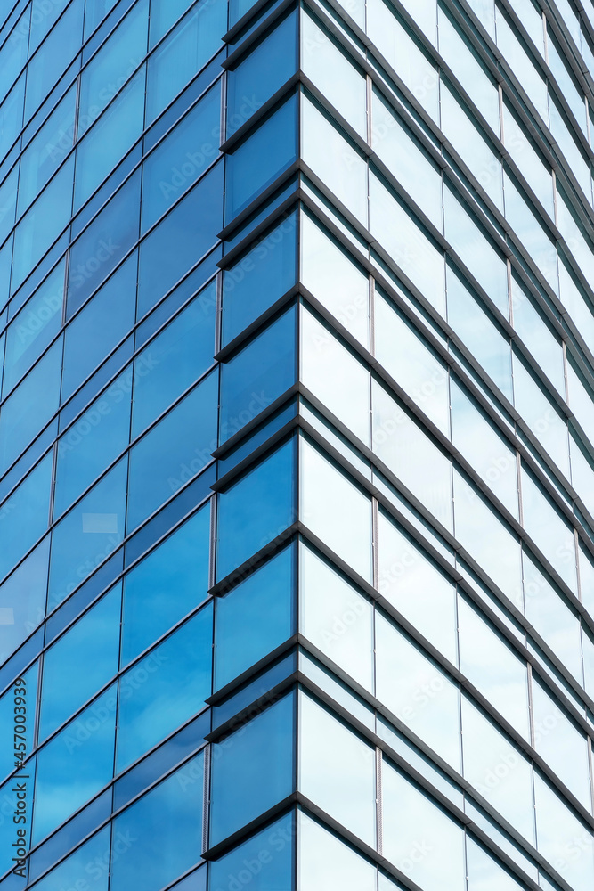 corner of symmetric geometry at glass window of modern office commercial building corner of symmetric geometry at glass window of modern office commercial building