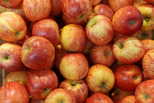 Close-up view of organic red apples in supermarket.