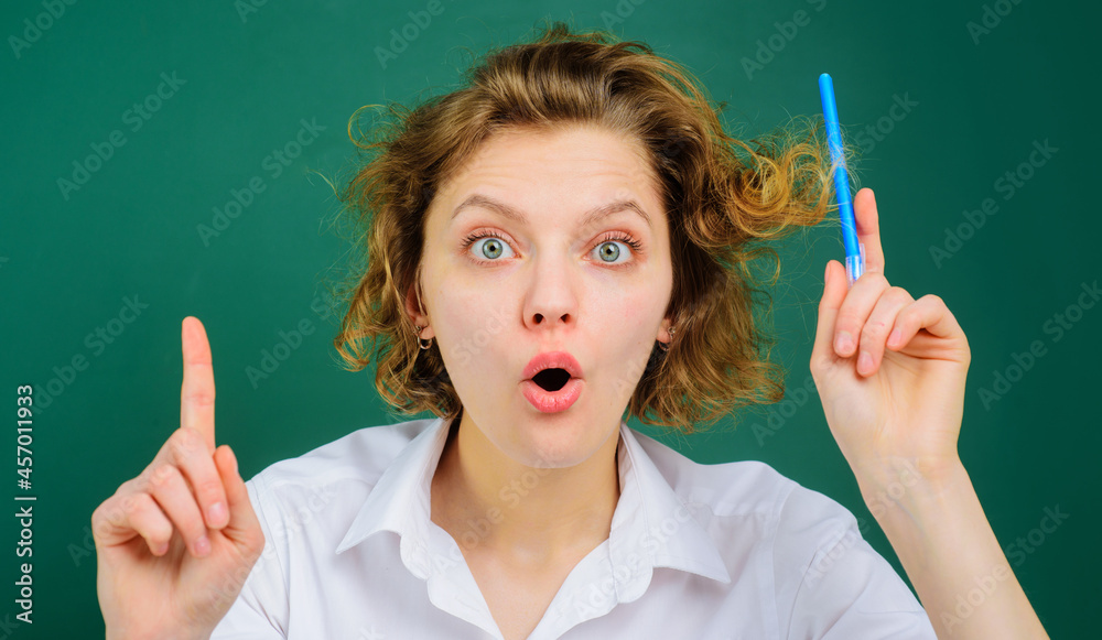 Female Teacher giving lesson to students in classroom. Back to school. Education. Job. Female Teacher giving lesson to students in classroom. Back to school. Education. Job.