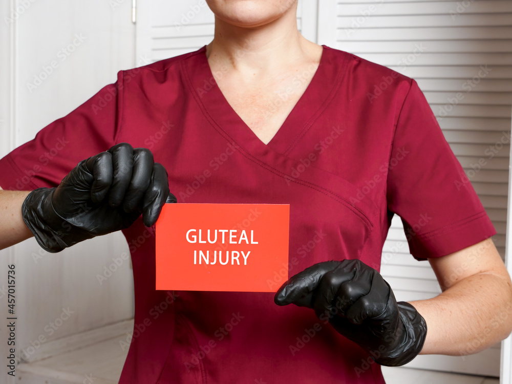Φωτογραφία Medical concept meaning GLUTEAL INJURY with inscription on the piece of paper