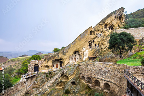 View of David Gareja Lavra orthodox monastery caves built in rock photo