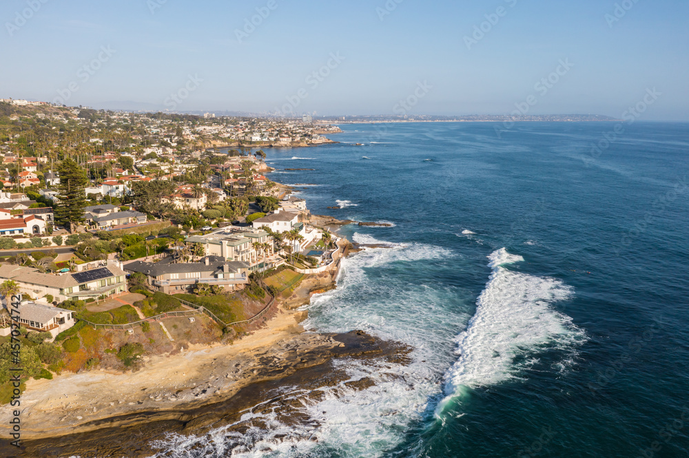 Aerial view of Windansea Beach in La Jolla with expensive coastal homes. 