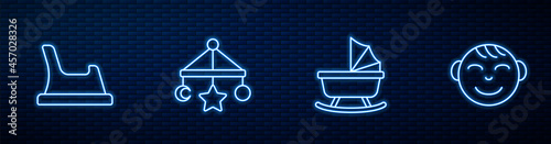 Set line Baby stroller, potty, crib hanging toys and Little boy head. Glowing neon icon on brick wall. Vector