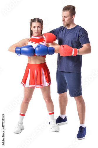 Cheerleader and boxer on white background © Pixel-Shot