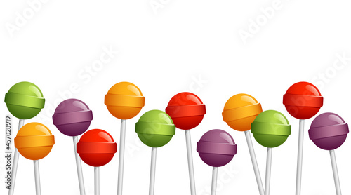 A line of colorful candy lollipops
