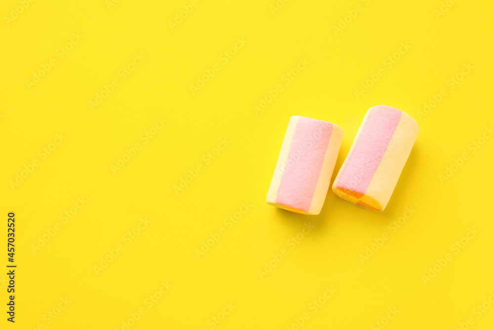 Tasty marshmallows on color background Tasty marshmallows on color background