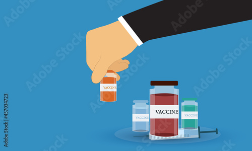 Businessman hand picking up selected coronavirus vaccine. Syringe and vaccine vial flat icons.