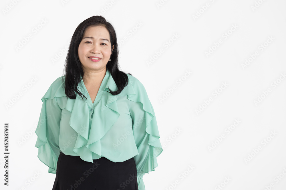 Portrait of middle aged Asian woman wearing mint green blouse looking neat smiling beautifully with confident isolated Portrait of middle aged Asian woman wearing mint green blouse looking neat smiling beautifully with confident isolated