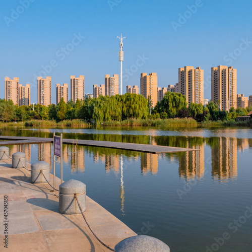 Buildings by the artificial lake
