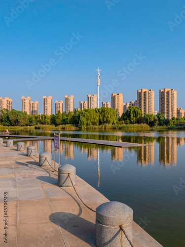 Buildings by the artificial lake