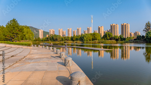 Buildings by the artificial lake