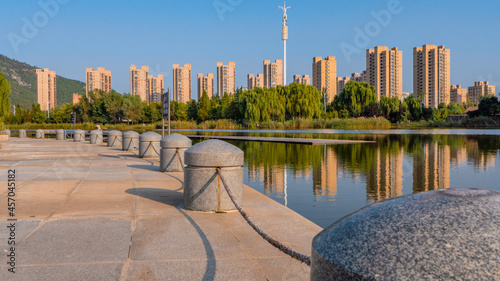 Buildings by the artificial lake