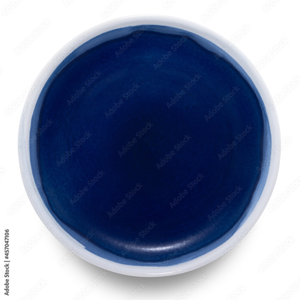 Blue circle ceramics plate isolated on white background. Blue circle ceramics plate isolated on white background.