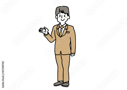 ご案内するスーツの男性