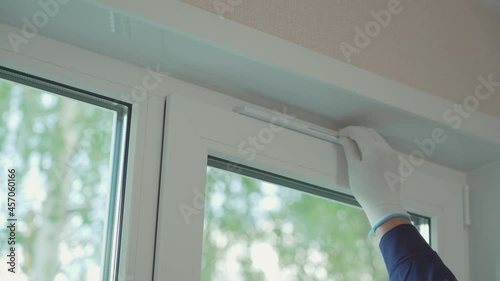 The worker will check the ventilation on the window after installation. Supply ventilation on plastic windows