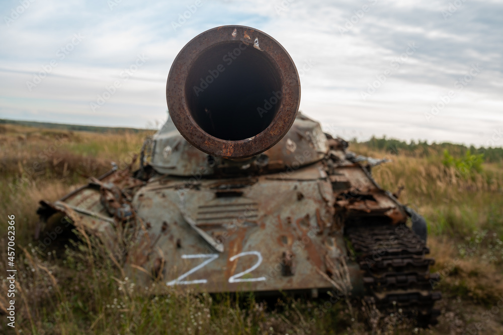 Old, destroyed tanks used as targets