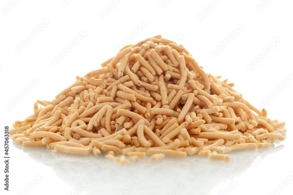 Close-up of Marwadi Bhujiya Indian namkeen (snacks), Indian spicy snacks (Namkeen), in a pile or heap, isolated over white background Close-up of Marwadi Bhujiya Indian namkeen (snacks), Indian spicy snacks (Namkeen), in a pile or heap, isolated over white background