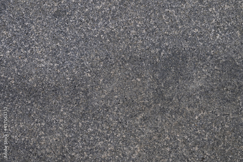 Abstract background of grey tiled walkway in a park