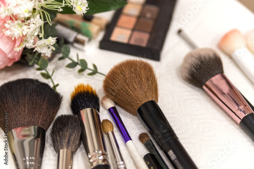 Make up the most necessary things. A set of brushes and professional cosmetics on the makeup artist's desk. Everything for applying makeup. Suitable for your beauty blog. Flatly. Copy space.