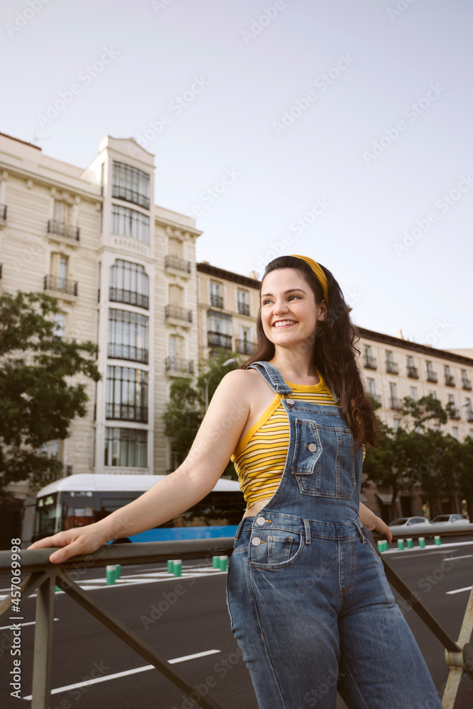 Charming woman standing on street Charming woman standing on street