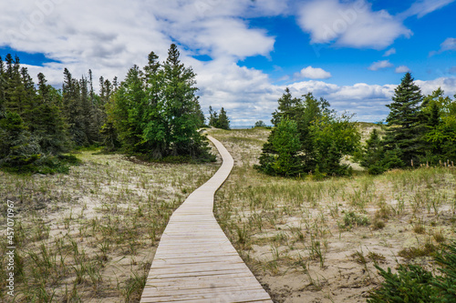 Boardwalk and hiking trail of the Pointe Aux Outardes Nature Park in the Quebec region of Cote Nord, Canada