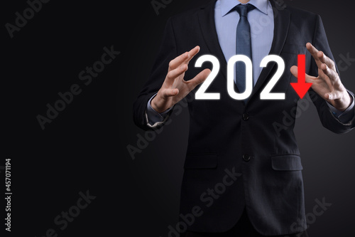 Plan business negative growth in year 2021 concept. Businessman plan and increase of negative indicators in his business, decline down business concepts.