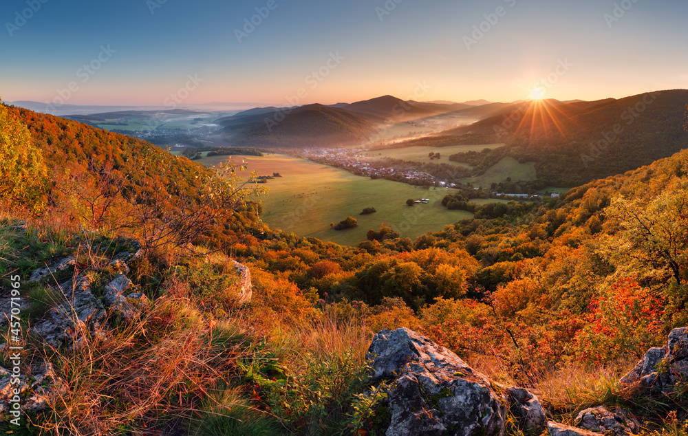 Plakat Autumn mountain panorama with golden forest and village in Slovakia