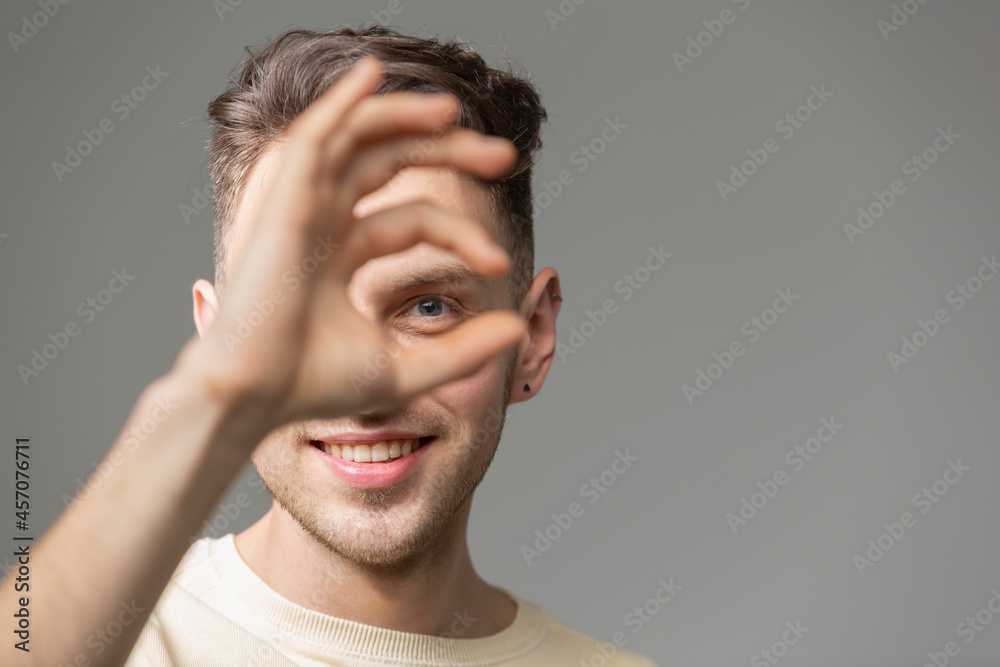 Portrait happy young man gesturing
Portrait happy young man gesturing