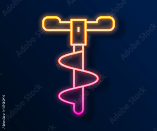 Glowing neon line Hand ice drill for winter fishing icon isolated on black background. Vector