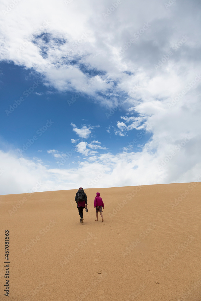 Mother and son walking on sand dune, Wilsons Promontory, Victoria, Australia
Mother and son walking on sand dune, Wilsons Promontory, Victoria, Australia