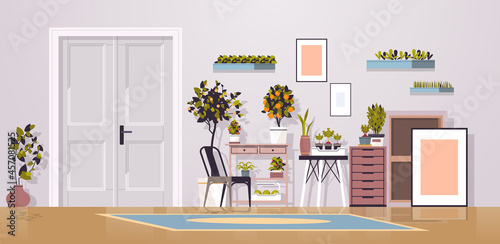 greenhouse potted plants on shelves gardening concept