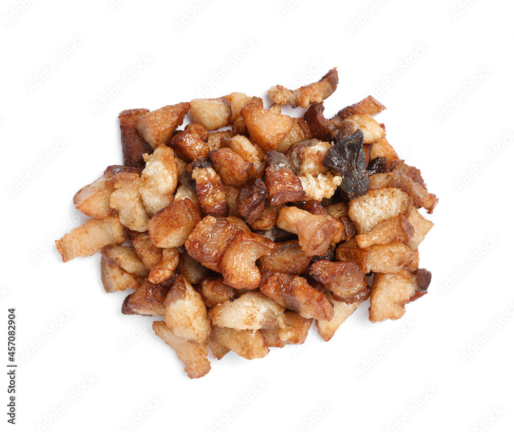Tasty fried cracklings on white background, top view. Cooked pork lard