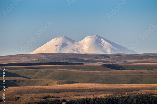 Snowy mountain Elbrus beautiful nature landscape, View at long distance.