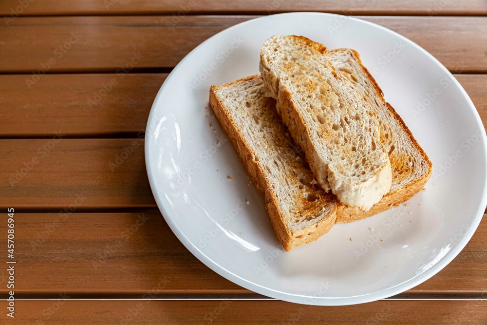 Breakfast plate, toast and jam with butter Breakfast plate, toast and jam with butter