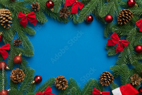 Christmas background with fir branches and Christmas decor. Top view  copy space for text