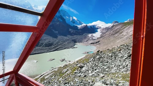 Lake and glacier view from the Cable Car along a steep railway in the Grossglockner National Park, Austria - Europe in summer season photo