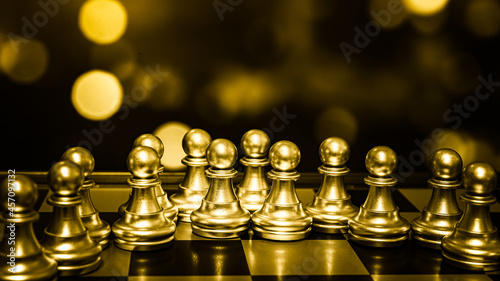 Closeup of chess characters on board games. to represent decision making in term of business strategy to find out the best solution to meet target objective and goal.