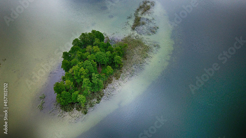 Aerial landscape from the drone - lonely isle. Lake in Masuria.