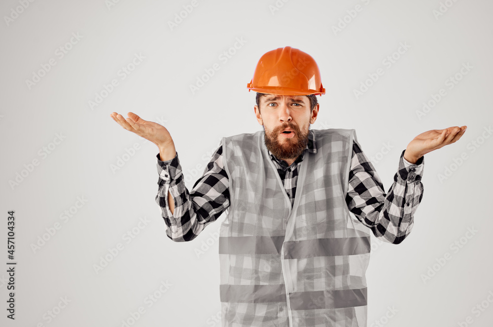 emotional man in working uniform construction building profession light background emotional man in working uniform construction building profession light background