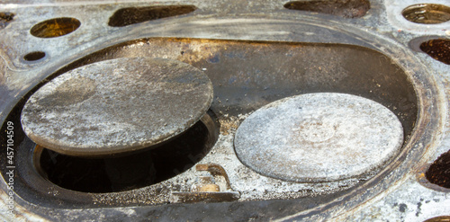 parts of disassembled engine, which was operated for a long time