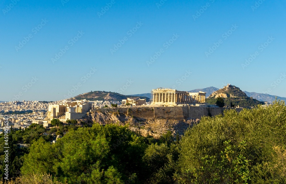 Fototapeta premium View of the acropolis from the monument to Filopappou, at sunset