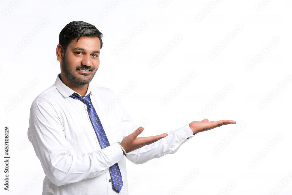 Young indian man showing expression on white background