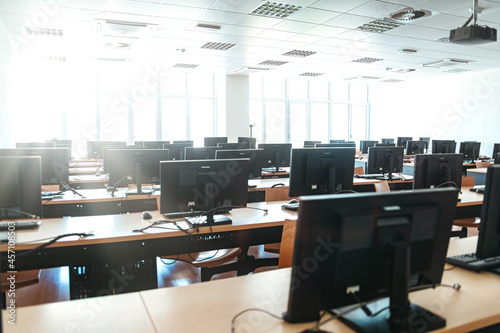 Empty open plan office with multiple workstations